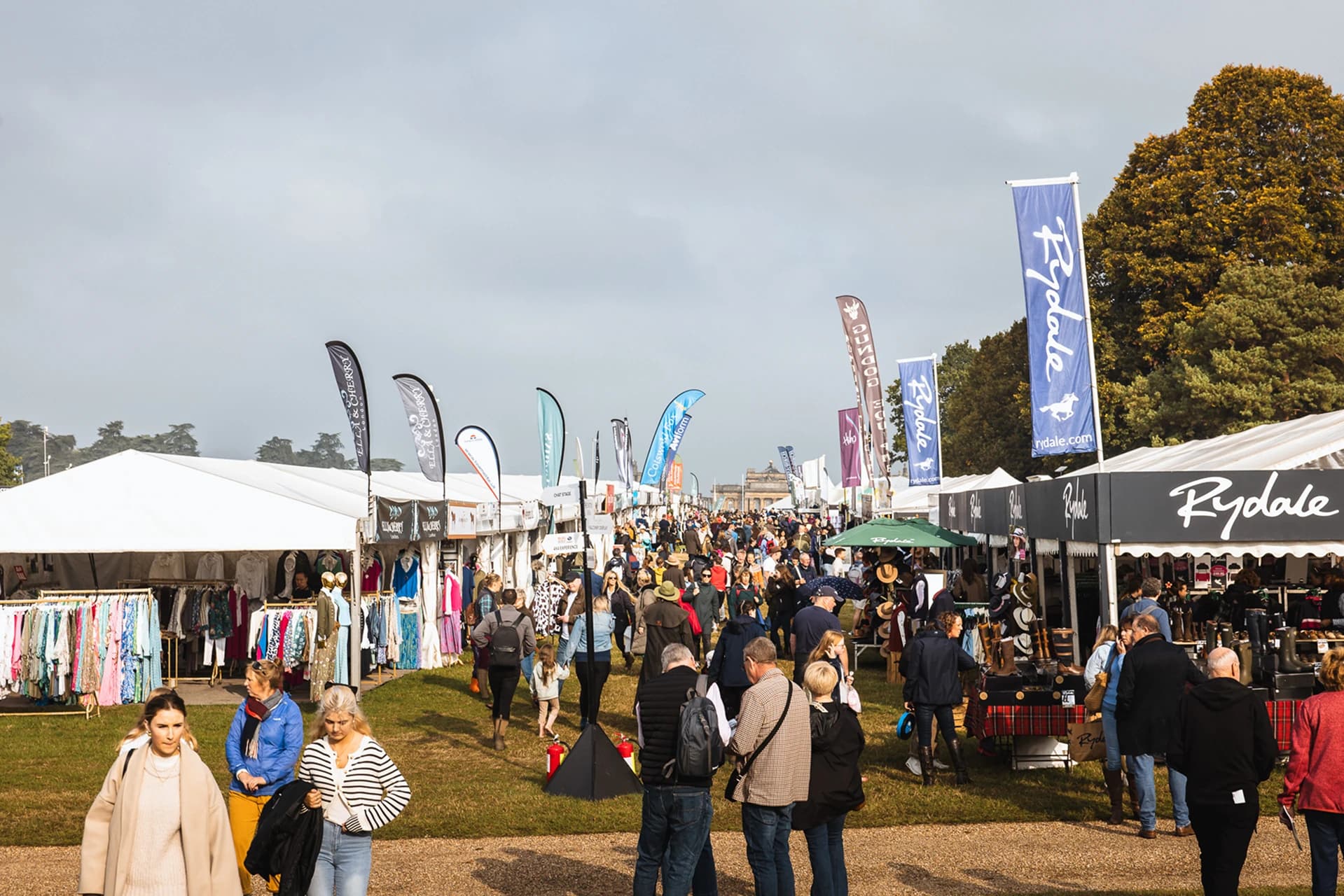 People browsing festival stalls and tents
